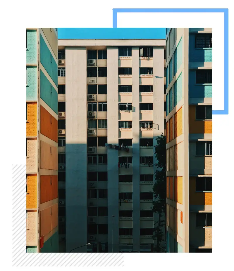 A picture of some buildings with a blue sky in the background. A picture of some buildings with a blue sky in the background.